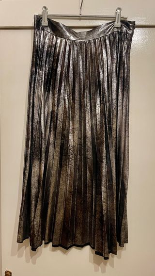 Falda metalizada plisada. Súper cómoda.