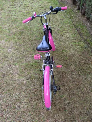 Bicicleta infantil rosa y negra