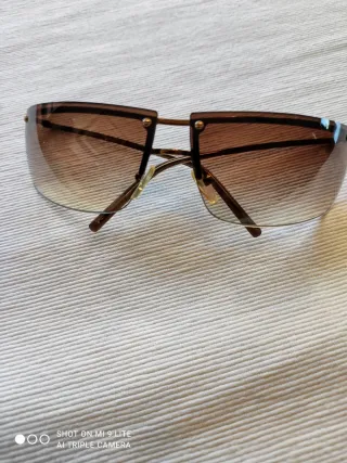 Gafas de sol Gucci marrones y doradas