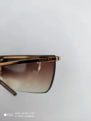 Gafas de sol Gucci marrones y doradas