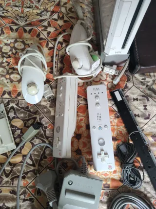 Consola Wii con bolsa,juegos y accesorios