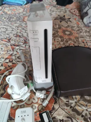 Consola Wii con bolsa,juegos y accesorios