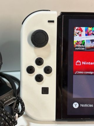 CON SCATOLO! Nintendo Switch OLED Bianca e Nera
