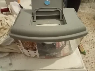 Jaula para pájaros y transportín