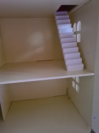 Casa de muñecas de madera