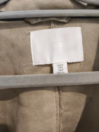 Abrigo largo de pelo beige y marrón