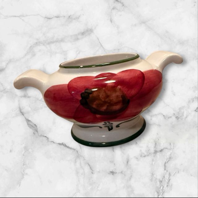 Ciotola in ceramica con fiore rosso