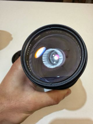 Olympus OM 200mm f4 con funda original