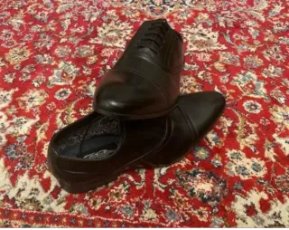 Elegantes zapatos de vestir de piel color negro