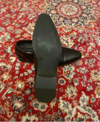 Elegantes zapatos de vestir de piel color negro