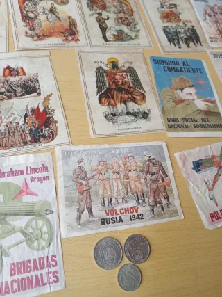 16 Carteles y Monedas de época de Franco
