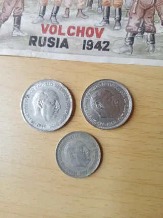 16 Carteles y Monedas de época de Franco