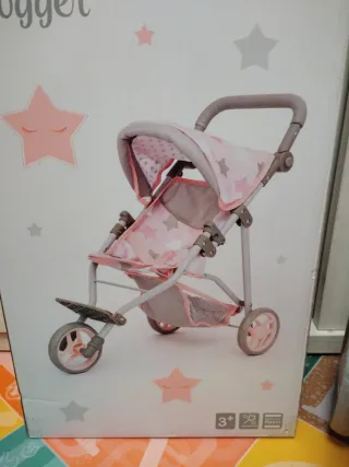Carro de muñecas rosa con estrellas