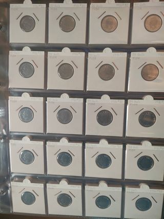 Lote 124 monedas 50 Cts - 49 en Flor. Album Beumer
