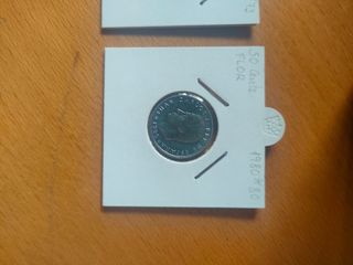Lote 124 monedas 50 Cts - 49 en Flor. Album Beumer