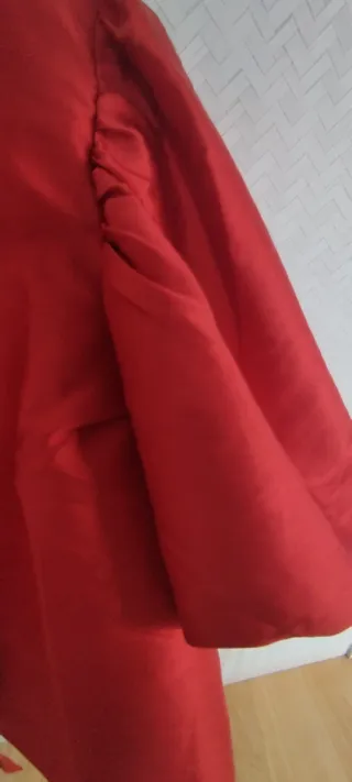 Torera roja con mangas abullonadas