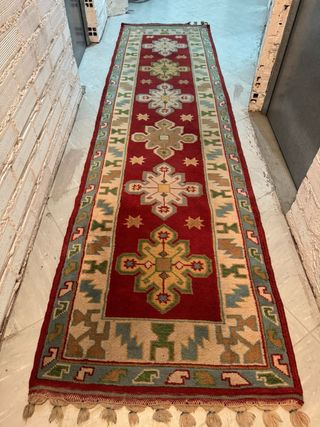 Alfombra persa de lana roja y beige