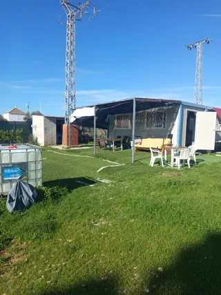 parcela de 2500 metros con agua y luz y dos caseta