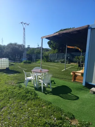 parcela de 2500 metros con agua y luz y dos caseta