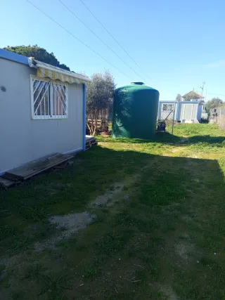 parcela de 2500 metros con agua y luz y dos caseta