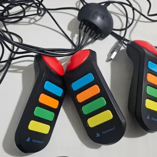 Mandos Buzz! y Juegos PS2