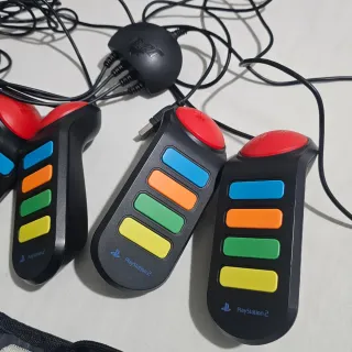 Mandos Buzz! y Juegos PS2