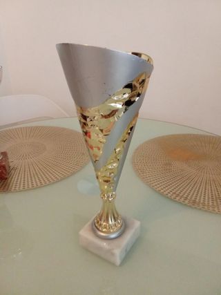 Copa de premios oro e argento