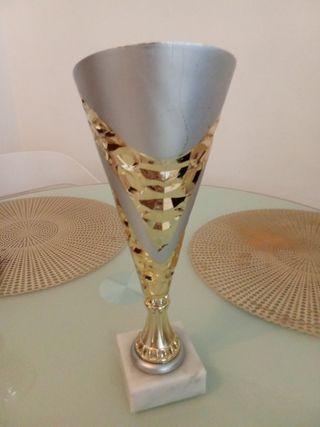 Copa de premios oro e argento