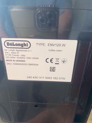 Cafetera Nespresso Blanca y Negra