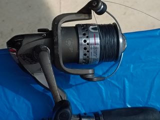 Caña de pescar con carrete