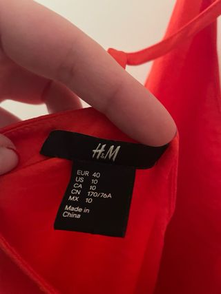 Mono corto naranja/rojo