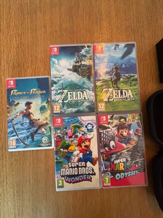 Nintendo Switch + 5 giochi + custodia + controller extra