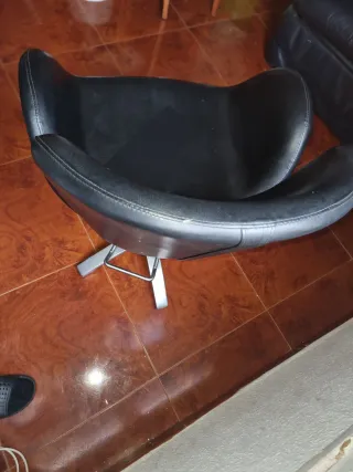 Silla de barbería con su posa descanso de pies