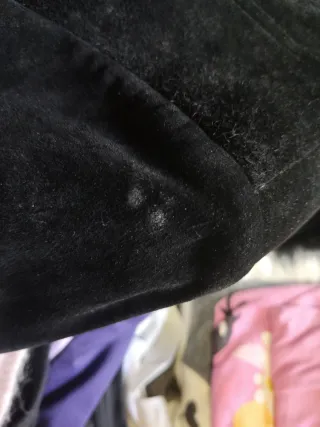 Chaqueta larga negra con pelo de piel natural