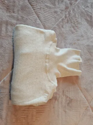 Jersey beige cuello alto