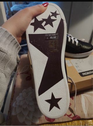 Scarpe North Star nere e argento con borchie