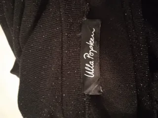 Maglietta nera con volant