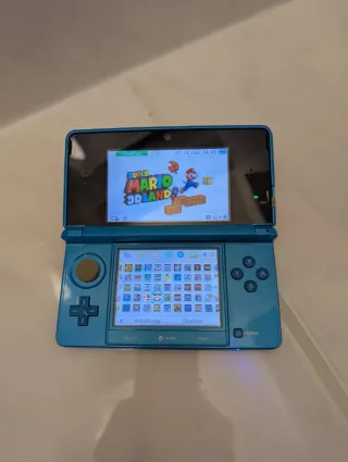Nintendo 3DS Azul + 100 juegos Pokemon Mario Zelda