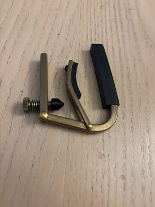 Cejilla para guitarra dorada