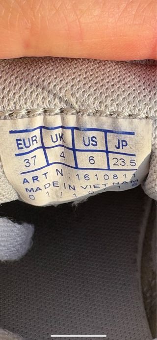 Deportivas Le Coq Sportif grises y blancas