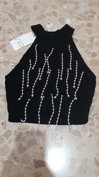 Top sin mangas. Tejido de chenilla y perlas. De Za