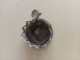 Bolsa porta-moedas antiga em prata com elefante.