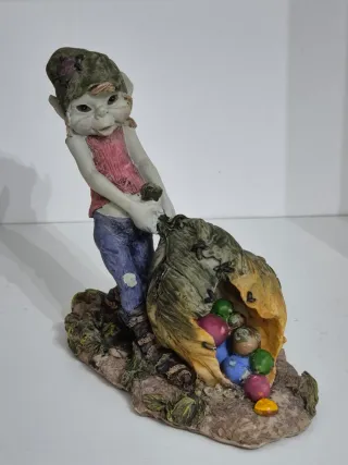 Bellissimo pixie con sacco di pietre