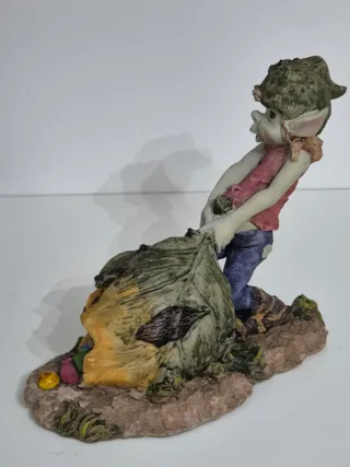 Bellissimo pixie con sacco di pietre