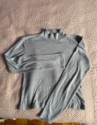 Jersey gris cuello alto