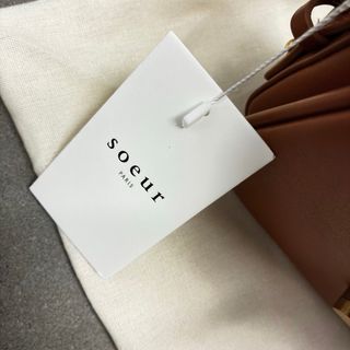 Borsetta Soeur marrone con dettagli oro