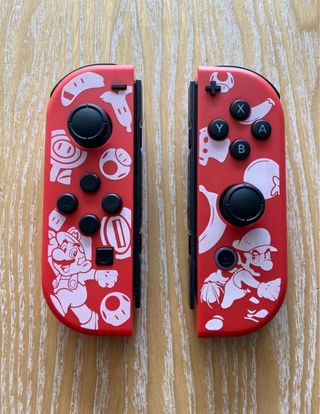Pack joycons Mario + grip nintendo switch