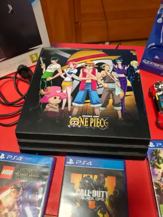 PS4 Pro + 4 Juegos + Auriculares