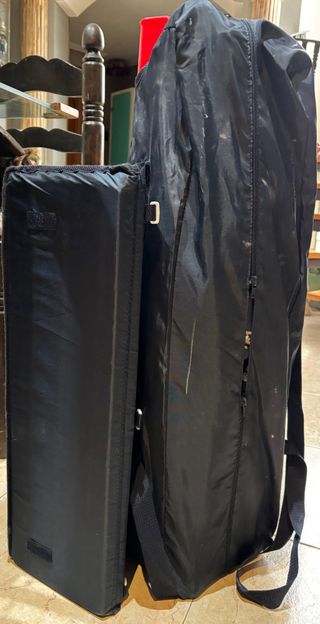 Cuna de viaje azul con ruedas