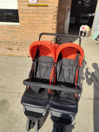 Carro gemelar naranja